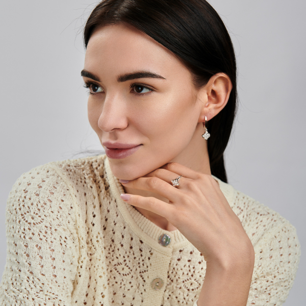 Срібна каблучка з золотими вставками