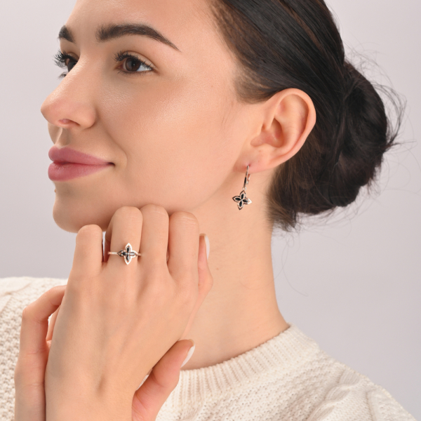 Серебряное кольцо с золотыми вставками