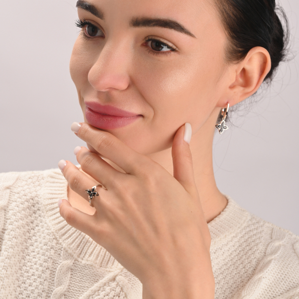 Серебряное кольцо с золотыми вставками