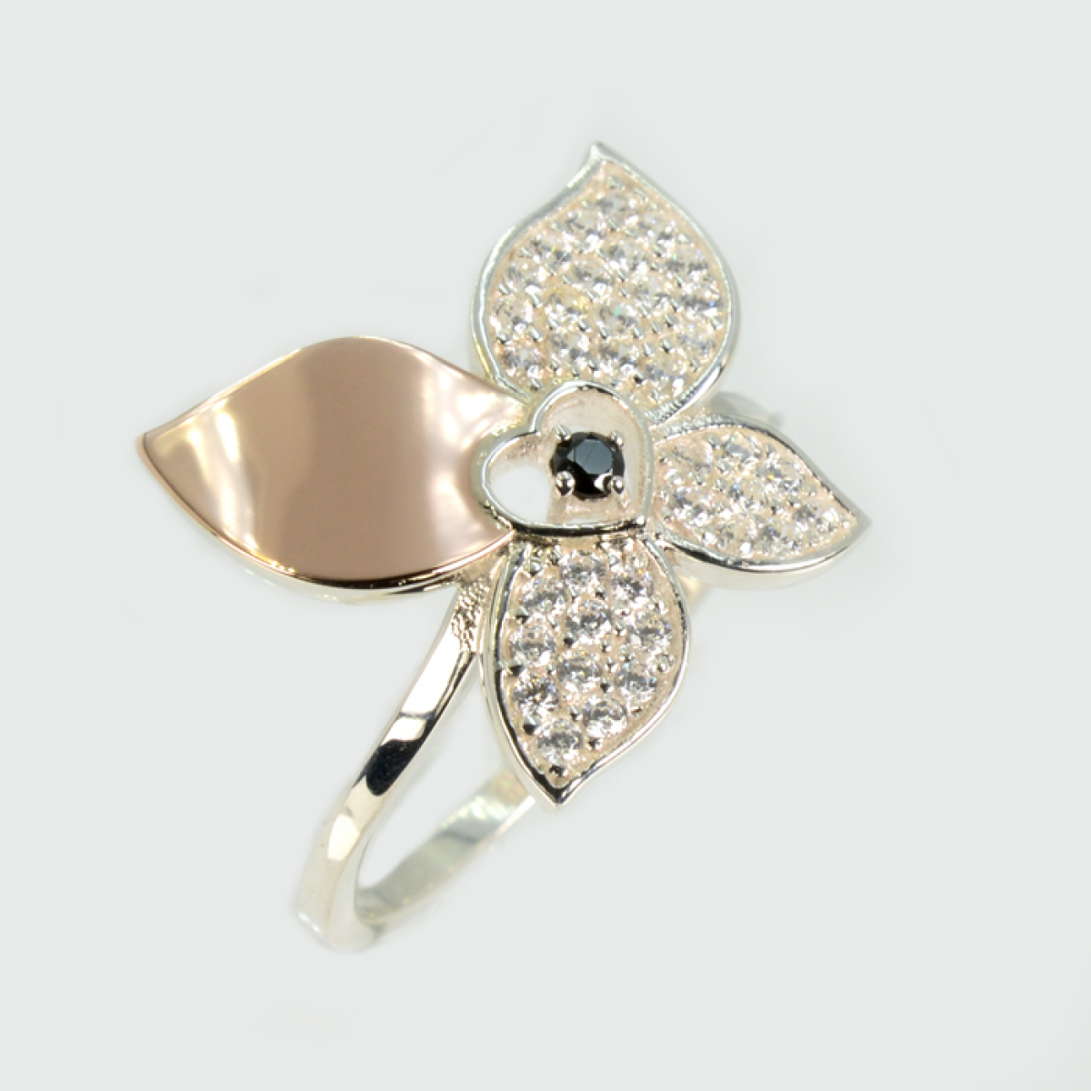 Срібна каблучка з золотими вставками