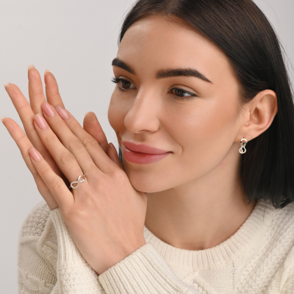 Срібна каблучка з золотими вставками