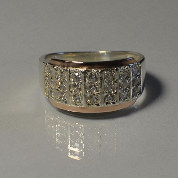 Срібна каблучка з золотими вставками