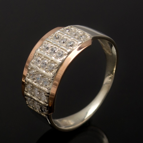 Срібна каблучка з золотими вставками