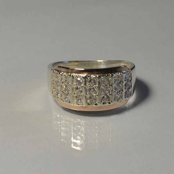 Срібна каблучка з золотими вставками