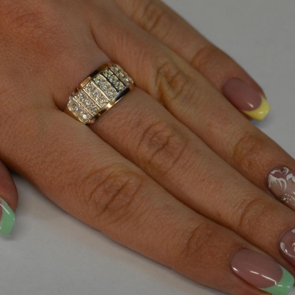 Срібна каблучка з золотими вставками