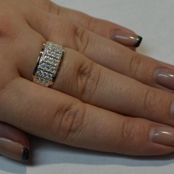 Срібна каблучка з золотими вставками