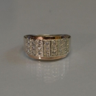 Срібна каблучка з золотими вставками