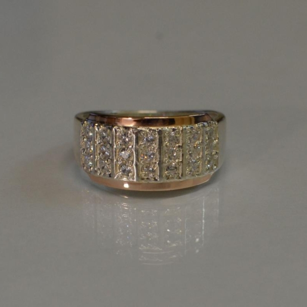 Срібна каблучка з золотими вставками