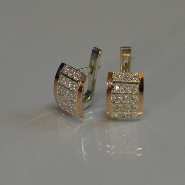 Срібні сережки з золотими вставками