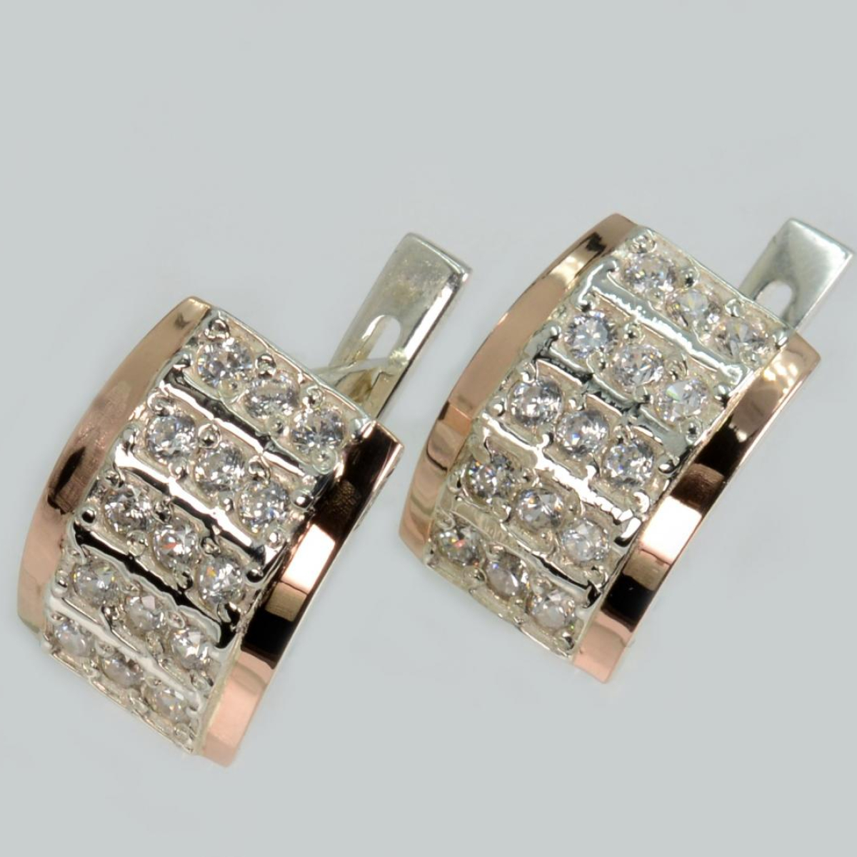 Срібні сережки з золотими вставками