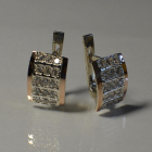 Срібні сережки з золотими вставками