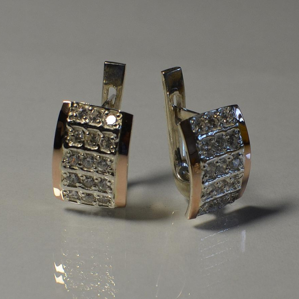 Срібні сережки з золотими вставками