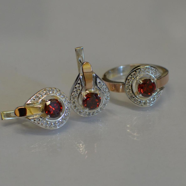 Срібний комплект з золотими вставками