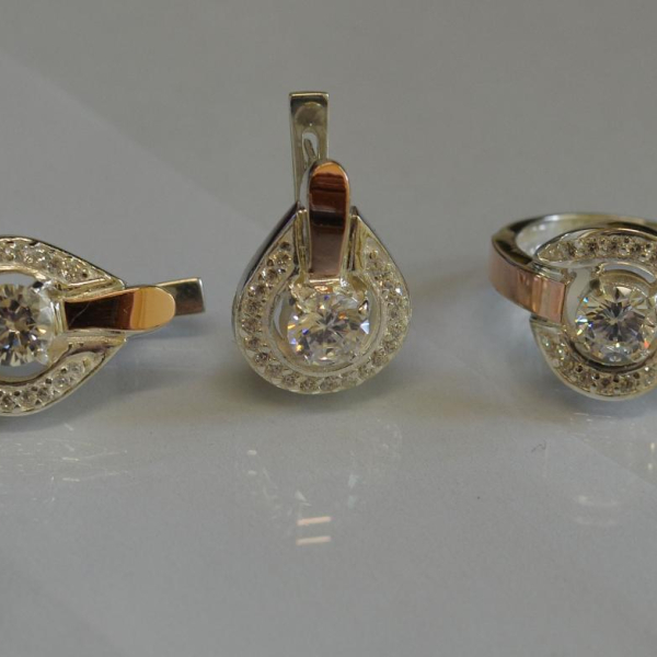 Срібний комплект з золотими вставками