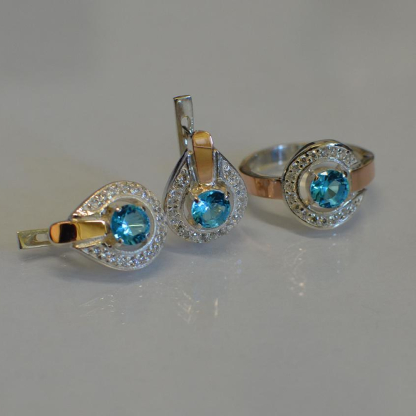 Срібний комплект з золотими вставками