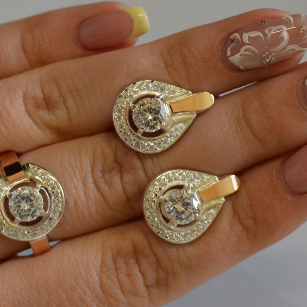 Срібний комплект з золотими вставками