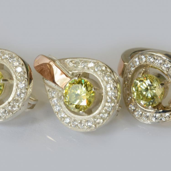 Срібний комплект з золотими вставками