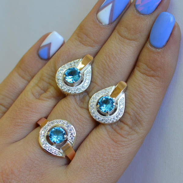 Срібний комплект з золотими вставками