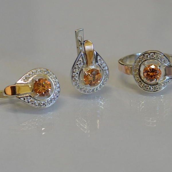 Срібний комплект з золотими вставками