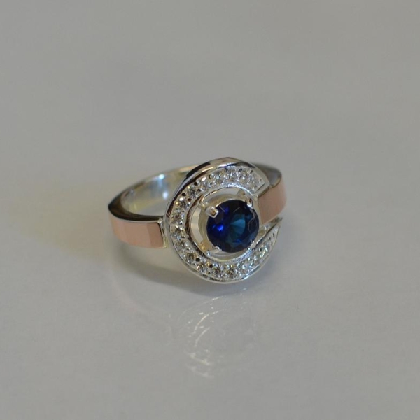 Срібна каблучка з золотими накладками