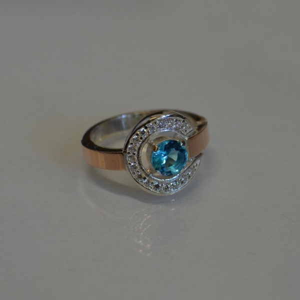 Срібна каблучка з золотими накладками