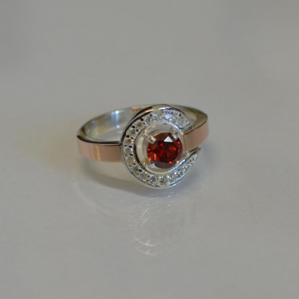 Срібна каблучка з золотими накладками