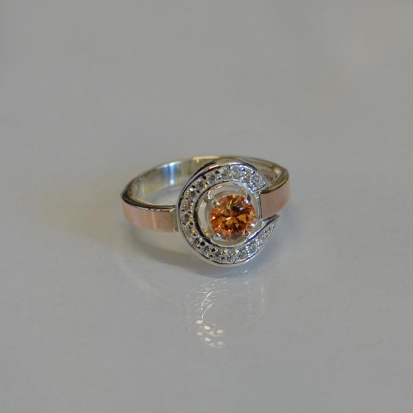 Срібна каблучка з золотими накладками