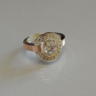 Срібна каблучка з золотими накладками