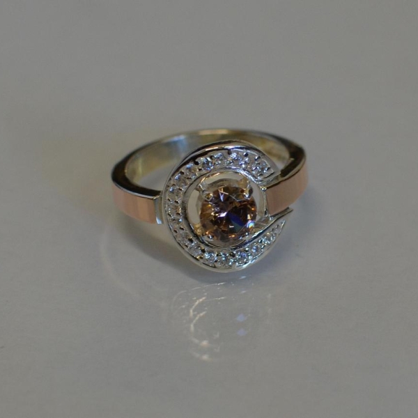 Срібна каблучка з золотими накладками