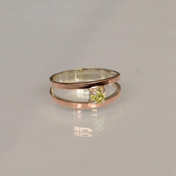 Срібна каблучка з пластинами із золота