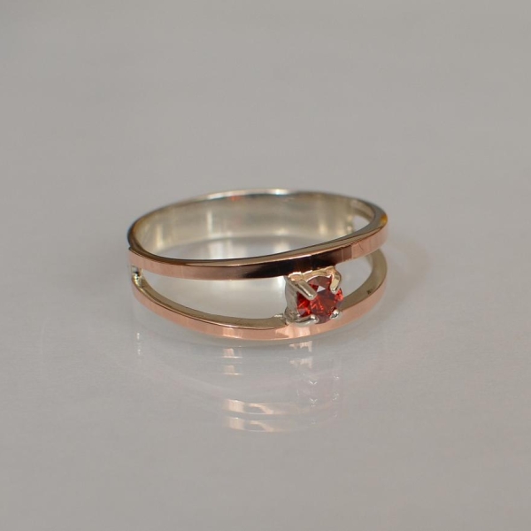 Срібна каблучка з пластинами із золота