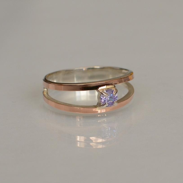 Срібна каблучка з пластинами із золота