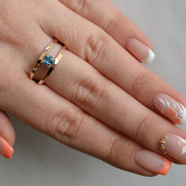 Срібна каблучка з пластинами із золота