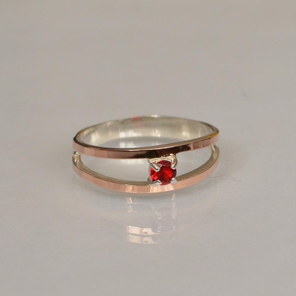 Срібна каблучка з пластинами із золота