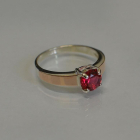 Срібна каблучка з золотими вставками