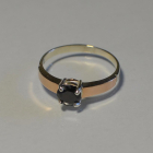 Срібна каблучка з золотими вставками