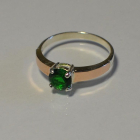 Срібна каблучка з золотими вставками