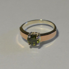 Срібна каблучка з золотими вставками