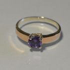 Срібна каблучка з золотими вставками