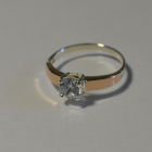 Срібна каблучка з золотими вставками