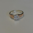 Срібна каблучка з золотими вставками