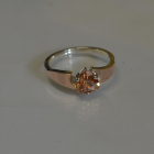 Срібна каблучка з золотими вставками