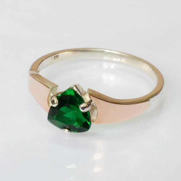 Срібна каблучка з золотими вставками