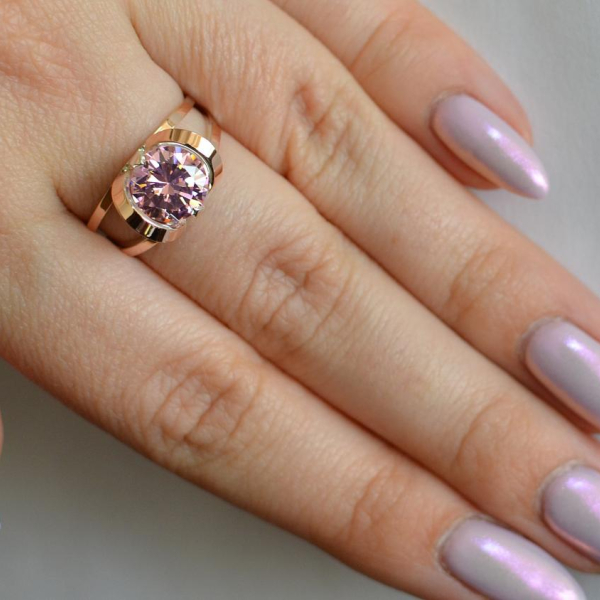 Срібна каблучка з золотими вставками