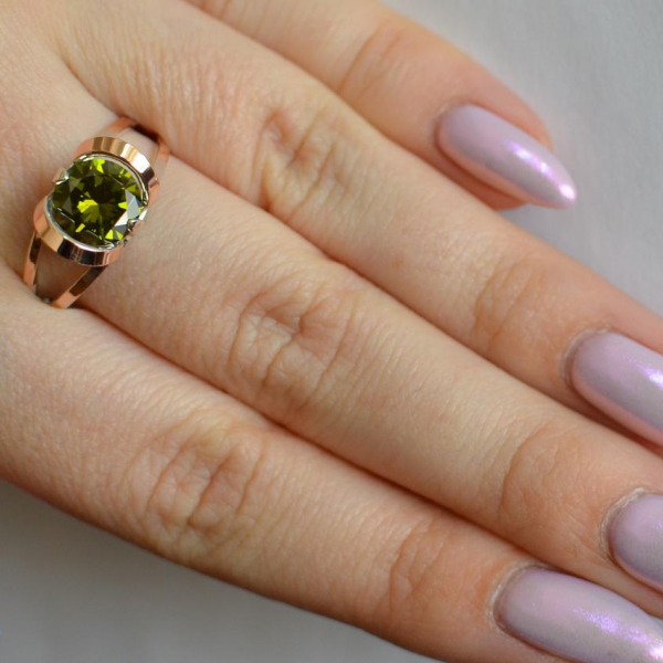 Срібна каблучка з золотими вставками