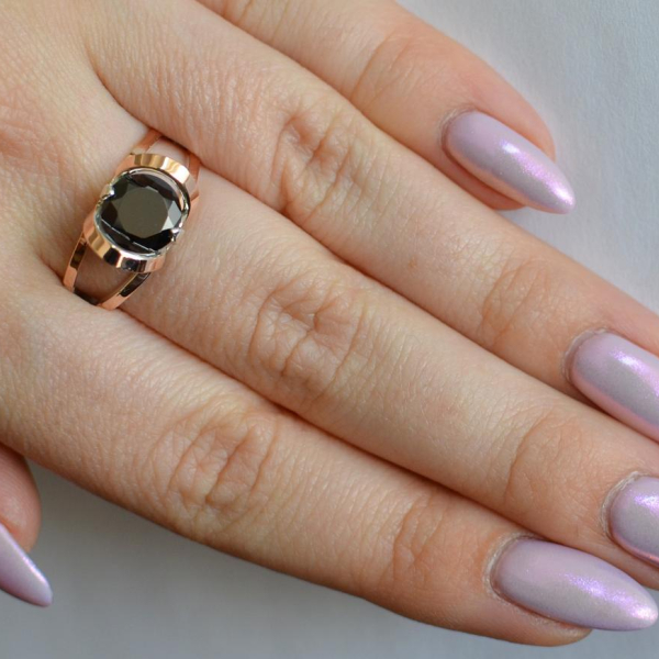 Срібна каблучка з золотими вставками