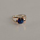 Срібна каблучка з золотими вставками