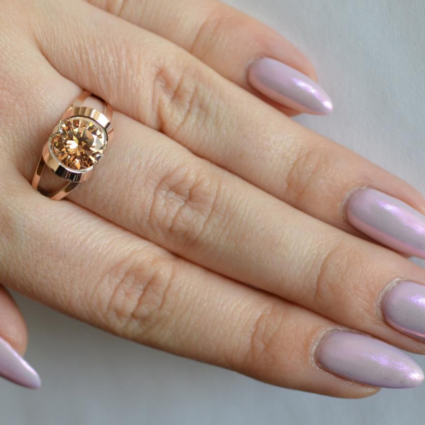 Срібна каблучка з золотими вставками