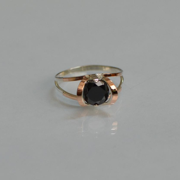 Срібна каблучка з золотими вставками