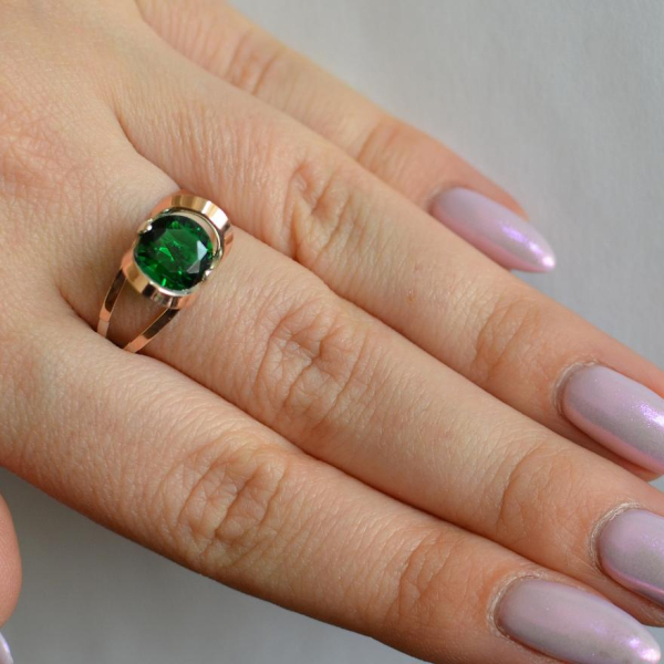 Срібна каблучка з золотими вставками